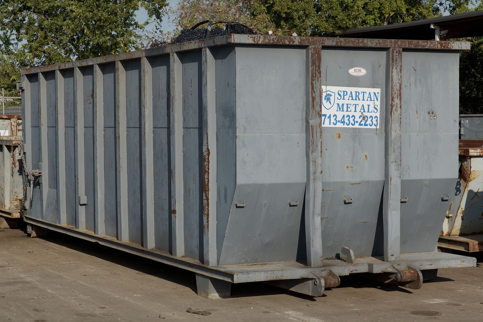 Spartan Metals roll-off container in the yard